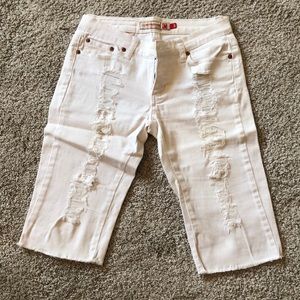 White ripped jean shorts